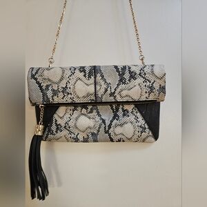 Francesca's Black and Cream Snake Print Clutch